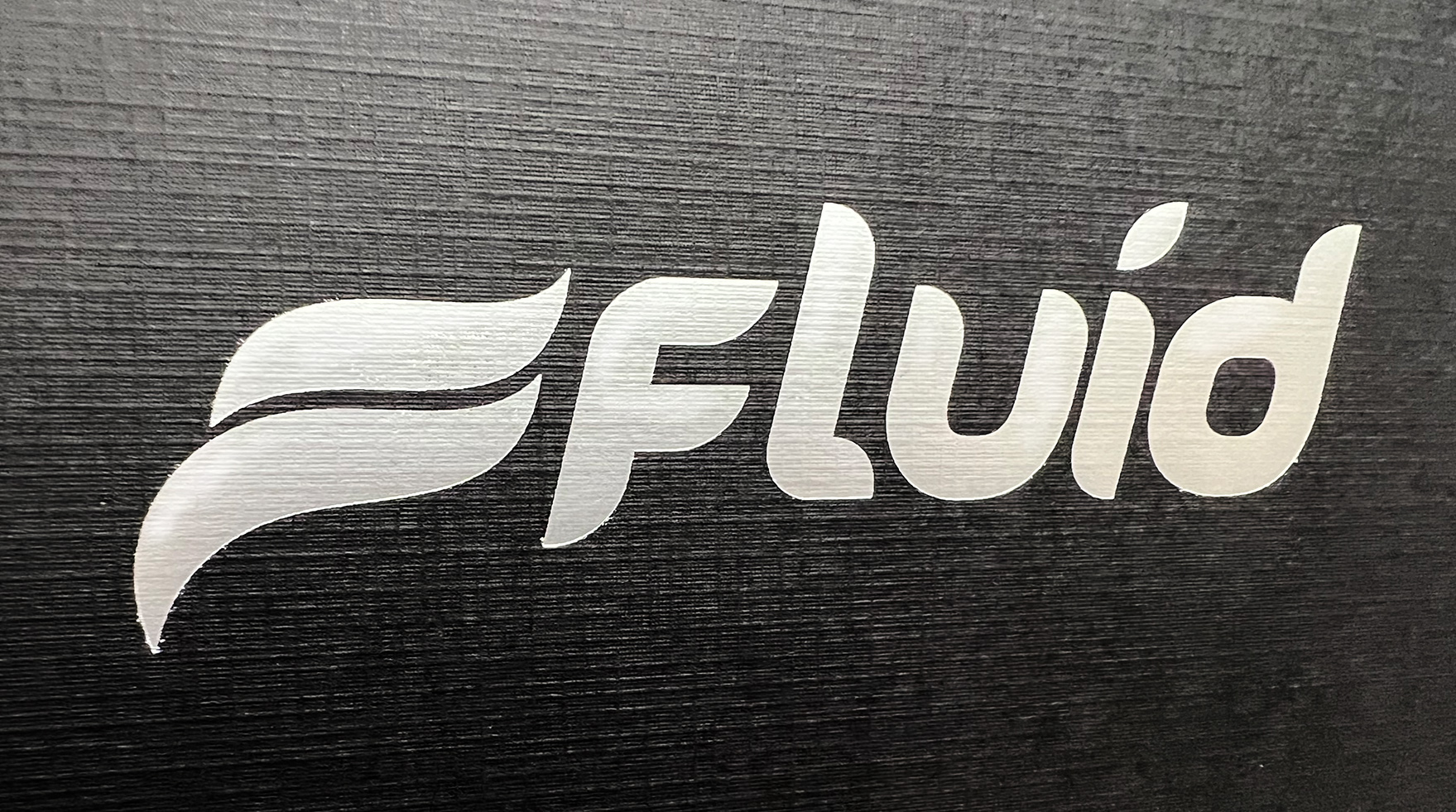 Closeup detail of Fluid Marine folder silver foil and linen 